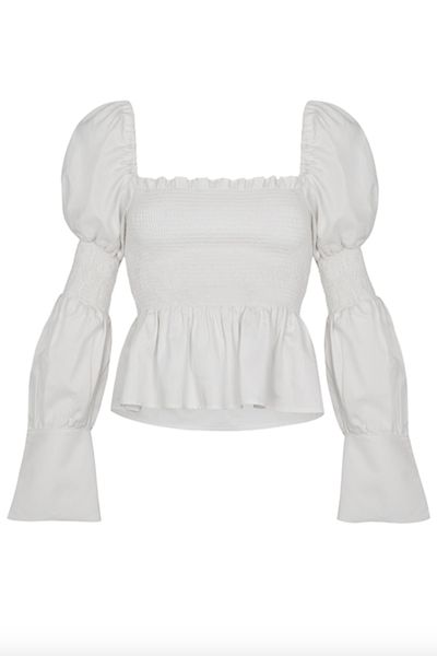 Blusa con nido de abeja y mangas bombachas.

Medidas
			Tallas
		S/M
			M/L
			 
		Largo delantero
			33 cm
			34 cm
			 
		Largo espalda
			32 cm
			33 cm
			 
		Contorno de cintura
			71cm -76cm
			77cm -82cm
			 
		Contorno de busto
			90cm-95cm
			96cm-100cm
			 
		
