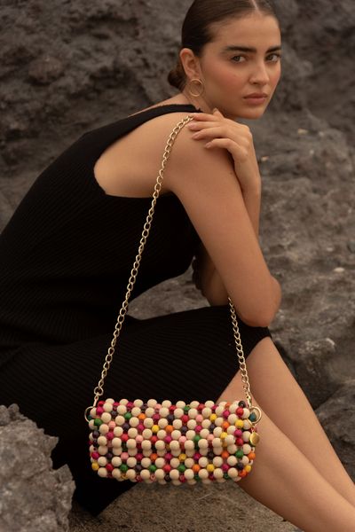 Cartera hecha de cuentas de Madera
